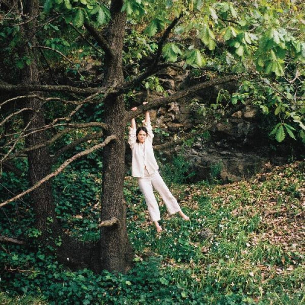 the album cover for Maple Glider - To Enjoy Is The Only Thing [Green & White Marble LP]