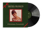 the album cover for Aretha Franklin - Christmas Essentials