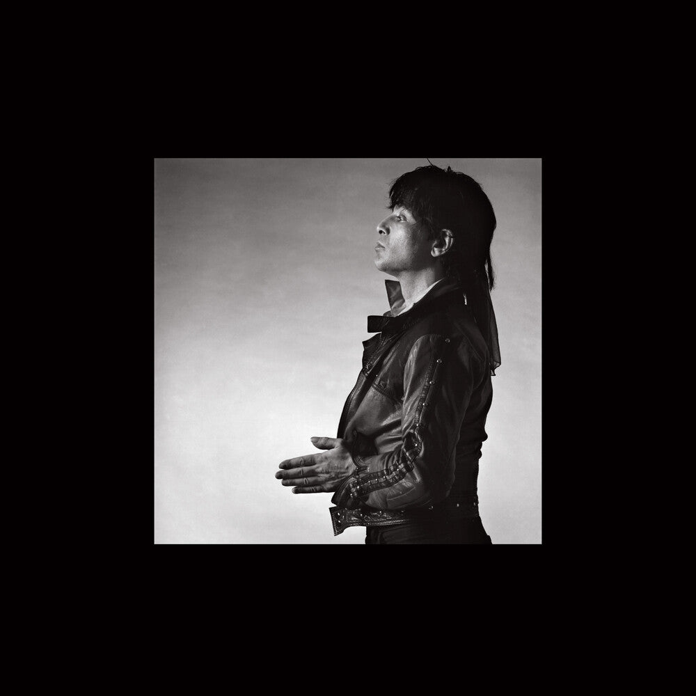 the album cover for Alan Vega - Alan Vega (Blue) [Colored Vinyl] [Deluxe] [Remastered]