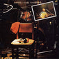 the album cover for Kyozo Nishioka  / Carib No Arashi - 77.9.9 Kyoto Taku Taku